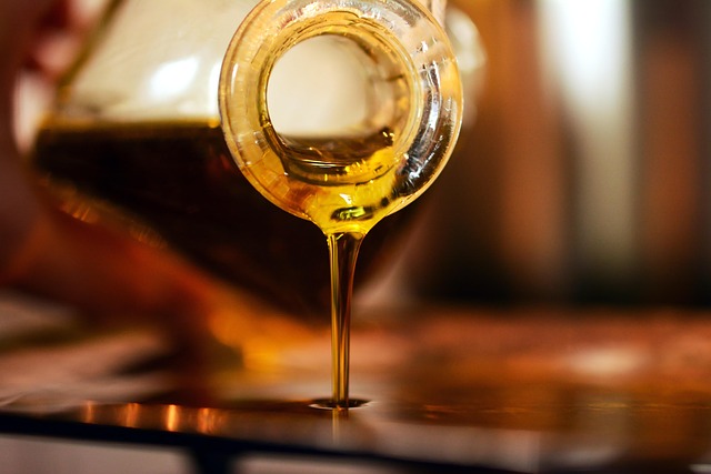 Perfume oil being poured